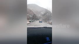 Truck driver doesn't realise his vehicle is ON FIRE until fellow motorist hails him down