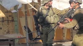 Palestinian protesters clash with Israeli troops in Hebron