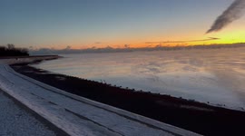 Cold morning sunrise over Lake Michigan from Montrose Harbor in Chicago. Zero degrees Fahrenheit.
