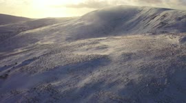 Stunning Drone Footage of Snow Blowing Over N. Ireland Mountain - Part 1