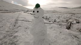 We Built A Snow Man In the Mountains
