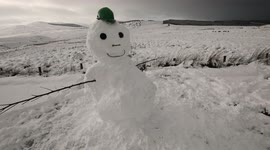 Snowman greets first snow in Northern Ireland mountains