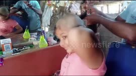 Indian 8-year-old girl shaves her head and donates hair to cancer patients