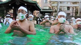 Watch this midwinter ice water bathing ceremony at Teppozu Inari Shrine in Tokyo