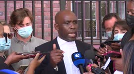South African parliament fire accused, Luvuyo Godla's legal representative Zandile Mafe ask why there are pictures of his client inside parliamnet.