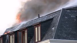 Fire flames of South African Parliament national assembly burning down in cape town