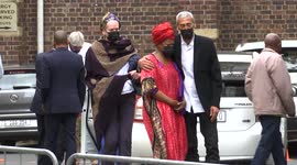 Desmond Tutu daughter Reverend Mpho Tutu with her partner Professor Marceline Furth and Roger Friedman Tutu's spokesman with family at the memorial service outside the St Georges Cathedral in Cape town south africa.