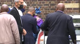 Archbishop Desmond Tutu's widow is Nomalizo Leah getting in the car to leave the st Georges Cathedral in cape town south Africa