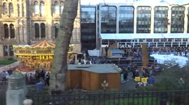 A glimpse of South Kensington ice rink from a double-decker bus window