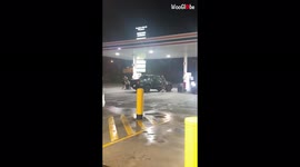 'Friends engage in a comical water fight at a petrol station in Australia '