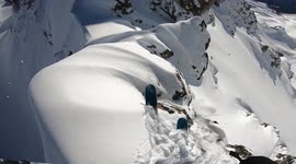 Skiers almost engulfed by cascading snow as avalanches triggers on Georgian mountain