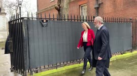 British Foreign Secretary Liz Truss and Sir Tim Barrow leave 10 Downing Street