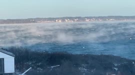 Arctic blast moves into northeastern USA bringing 'sea smoke'