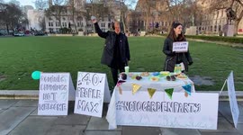 Protesters host a BYOB party with snacks outside Parliament as Boris Johnson faces mounting pressure over the Downing Street parties during lockdown