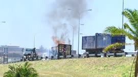 Truck trailer burning on the M5 highway over the N2 highway bridge in Cape town South Africa