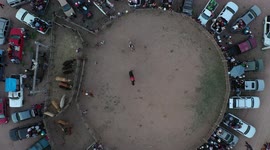 Aerial view decredondel or area rodeo or jaripeo durnate the afternoon of sabaso of glory of Holy Week 2019. Rodeo riders ride bulls in a cmpeticion in Cuquiarachic, Sonora, Mexico. The community of Cuquiarachic, was founded in 1934. It is a small town lo