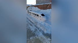 Elderly man sculpts bullet train out of mound of snow in northern China