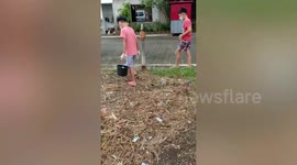 Boy, 8, roams streets and feeds stray cats in Manila, the Philippines