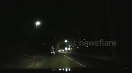 Another Cyclist, riding in the dark, no lights, on wet night.