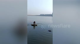 Chinese fisherman saves young man from drowning in river