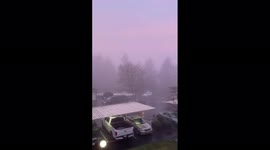 Purple haze: Seattle sky filled with beautiful pink fog