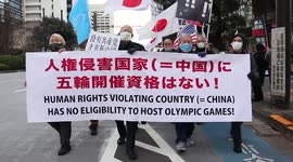 Beijing Olympics Boycott Supporters Rally in Tokyo's Luxury Ginza Shopping Area