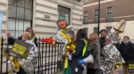 Amnesty International staged solidarity with refugees protest outside London embassy of Poland