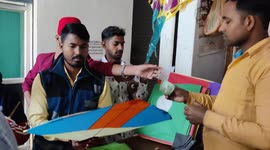 People crowd a kite shop in India ahead of an international kite festival in Dildar Nagar, Uttar Pradesh