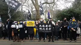 Hundreds of Hong Kong pro-democracy campaigners in London deliver letters to defend press freedom as media crackdown continues