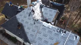 Big Roof calls for a big crew!shingles! Working it!