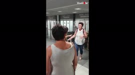 'Wife jumps into military husband's arms at airport following his return from mission'