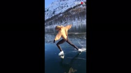 Stunning footage shows pro Swiss figure skater dancing on frozen lake