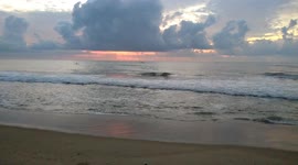 Fishermen fishing in the Morning on cloudy beach at Neelankarai