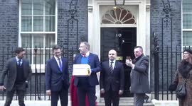 Conservative MP joins group handing in  petition against vaccine passports to 10 Downing Street
