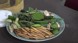 Thai locals prepare herbs believed to relieve symptoms of Covid-19