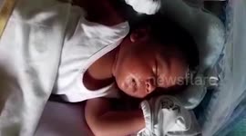 Adorable 'Cruella De Vill' baby born with patch of white hair in the Philippines
