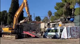 Israeli authorities today forced a Palestinian to continue self-demolishing his store in the East Jerusalem neighborhood of Sheikh Jarrah