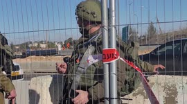 Israeli forces gather at a scene where a Palestinian man shot dead after allegedly attempting to carry out a stabbing attack