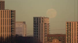 Mesmeric Wolf Moon rises over east London's Docklands
