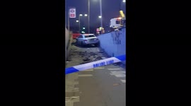 Silver car crashes through barriers onto footpath in west London