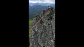 Free Solo slacklining, balancing hundreds of feet high on a thin rope without a safety leash