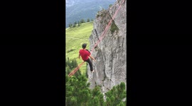 Free Solo slacklining, balancing hundreds of feet high on a thin rope without a safety leash- Looking down at DEATH