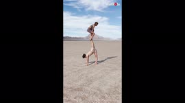 ''Trust, Strength & Flexibility' Acrobatic partners nail UNREAL pose at Dry Lake Bed'