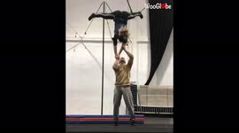 'AcroYoga couple's RISKY hand-to-hand handstand attempt GOES WRONG!'