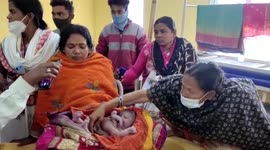 Locals flock to see baby born with four arms and legs in eastern India