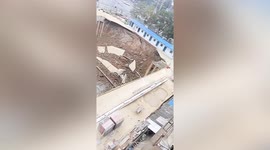 Residents in nearby buildings evacuated as construction site collapses in central China