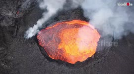 Photographer captures fiery footage of lava bubbling away at Reunion island's volcano