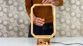 YouTuber makes their own DIY lamp that is switched on by hanging magnets