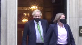 Embattled British Prime Minister Boris Johnson leaves 10 Downing Street ahead of PMQs