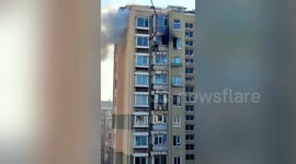 Residents climb out of 9th-floor windows to attempt to escape flat fire in China